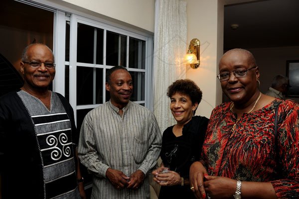 Winston Sill / Freelance Photographer
UWI Vice Chancellor Prof. Nigel Harris host Christmas Party, held at Long Mountain Road, UWI, Mona on Thursday night December 8, 2011. Here are Sir Kenneth Hall (left); Milton Samuda (second left); Mrs.--- Samuda (second right); and Audrey Hinchcliffe (right).