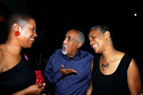 Winston Sill / Freelance Photographer
UWI Vice Chancellor Prof. Nigel Harris host Christmas Party, held at Long Mountain Road, UWI, Mona on Thursday night December 8, 2011. Here are Dr. Iva Gloudon (left), Trinidad and Tobago High Commissioner; Prof. Allan Kirton (centre); and Dr. Yvette Williams-Harris (right).