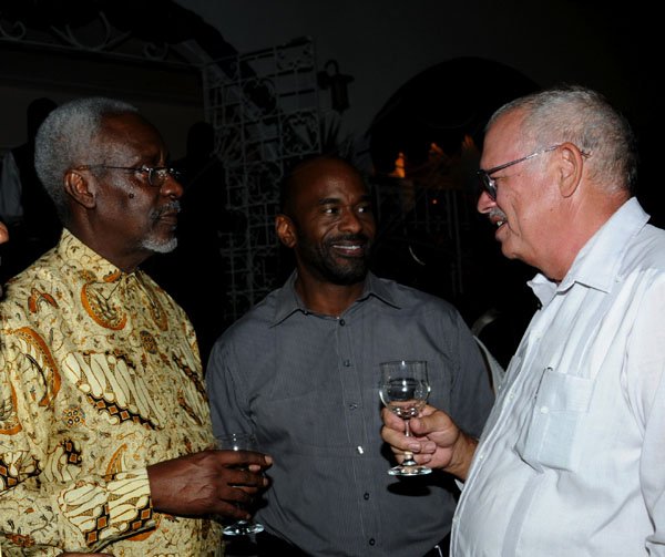 Winston Sill / Freelance Photographer
UWI Vice Chancellor Prof. Nigel Harris host Christmas Party, held at Long Mountain Road, UWI, Mona on Thursday night December 8, 2011.Here are Hon. PJ Pattersopn (left); Raymond Campbell (centre); and Prof. Peter Fletcher (right).
