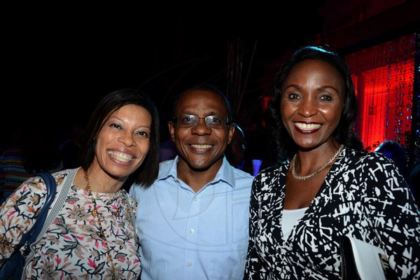 Winston Sill/Freelance Photographer
PUBLIC AFFAIRS DESK:-----CEO at GraceKennedy Financial Group Limited Courtney Campbell joins Ernst and Young's Allison Peart (left) and Jamaica Flour Mills' Maxine Smith at the Victoria Mutual Building Society Anniversary Reception, held at The East Lawn, Devon House, Hope Road on Friday night November 14, 2014.