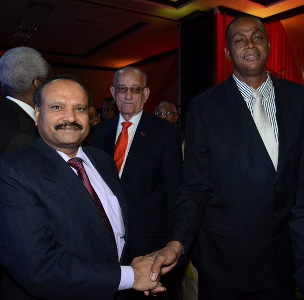 Winston Sill/Freelance Photographer
The 10th Anniversary of the Courtney Waslh Award for Excellence, held at Jamaica Pegasus Hotel, New Kingston on Thursday night October 16, 2014. Here are  Indian High Commissioner ----??? Singh (left); Mike Fennell (centre); and Courtney Walsh (right).