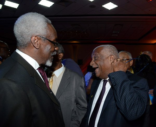 Winston Sill/Freelance Photographer
The 10th Anniversary of the Courtney Waslh Award for Excellence, held at Jamaica Pegasus Hotel, New Kingston on Thursday night October 16, 2014. Here are former Prime Minister PJ Patterson (left); and Glen Christian (right).