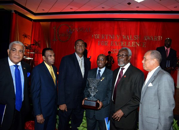 Winston Sill/Freelance Photographer
The 10th Anniversary of the Courtney Waslh Award for Excellence, held at Jamaica Pegasus Hotel, New Kingston on Thursday night October 16, 2014. Here from left are Minister Robert Pickersgill; W. Billy Heaven; Courtney Walsh; Laurel Smith;  former Prime Minister PJ Patterson; and Ally McNab.