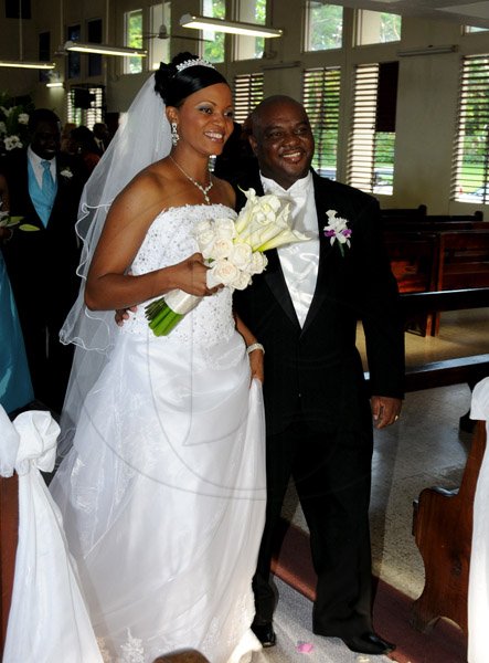 Winston Sill / Freelance Photographer
The celebration of Holy Matrimony between Mark Theophilus Cole and Jaydeen Alicia Oliver, held at the Ocho Rios Baptist Church, St. Ann on Saturday January 19, 2013.