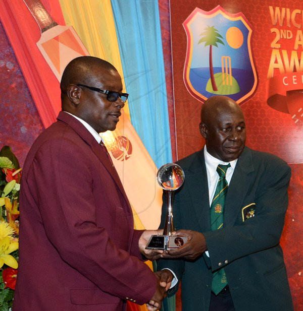Winston Sill/Freelance Photographer
The West Indies Cricket Board Inc. (WICB) and The West Indies Players Association (WIPA) presents the WICB/WIPA 2nd Annual Awards Ceremony, held at the Jamaica Pegasus Hotel, New Kingston on Thursday night June 5, 2014. Here are Richie Richardson (left); and Junior Bennett (right).