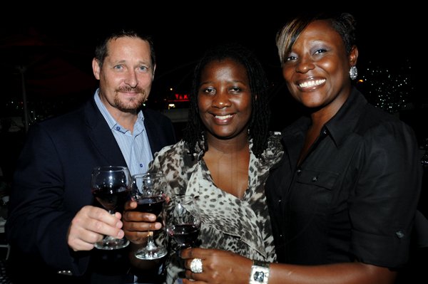 Winston Sill / Freelance Photographer
Spanish Court Hotel and J. Wray and Nephew  presents Wine Tasting Mondays, held at Spanish Court Hotel, St. Lucia Avenue, New Kingston on Monday night November 26, 2012. Here are Pierre de Villiers (left); Siphokazi Hermans (centre), of the South African Embassy; and Georgia Smith (right),  J. Wray and Nephew Wine Ambassador.