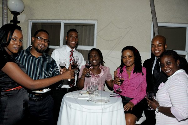 Winston Sill / Freelance Photographer
Spanish Court Hotel and J. Wray and Nephew  presents Wine Tasting Mondays, held at Spanish Court Hotel, St. Lucia Avenue, New Kingston on Monday night November 26, 2012. Here Kerene Dyer (left), of Wray and Nephew pose with the Accent Marketing team of  Coy Guthrie (second left); Gregory Elliott (third left); Jossett Melish (centre); Pauline Douglas (third right); Andres Cope (second right), of Spanish Court; and Thangela McDermott (right).