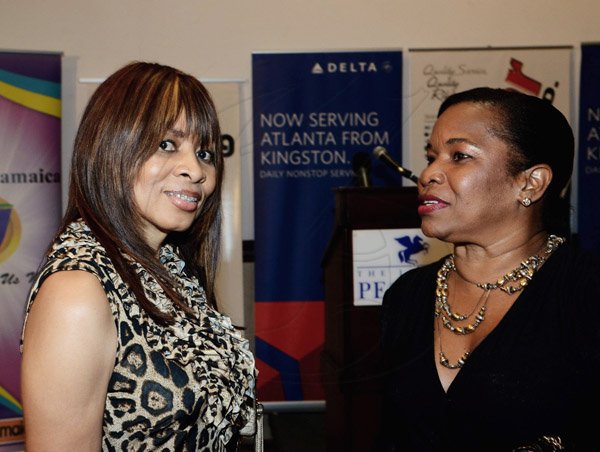 Winston Sill/Freelance Photographer
PUBLIC AFFAIRS DESK:-----CEO of Virgen Advertising Limited, Colleen Brown-Jackson (left) catches up with Buzzz Magazine's Janet Fagan.
 Wolmers Trust presents the Media Launch of Ailey2, held at the Jamaica Pegasus Hotel, New Kingston on Thursday night may 29, 2014.