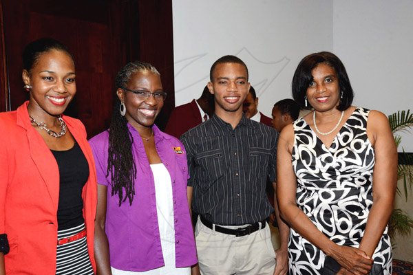Winston Sill/Freelance Photographer
PUBLIC AFFAIRS DESK:-----It's all smiles for (from left) Terri-Karelle Reid, Gleaner online brand manager, Paula-Ann Porter-Jones, her son Taro, and Olive McNaughton. Wolmers Trust presents the Media Launch of Ailey2, held at the Jamaica Pegasus Hotel, New Kingston on Thursday night may 29, 2014.