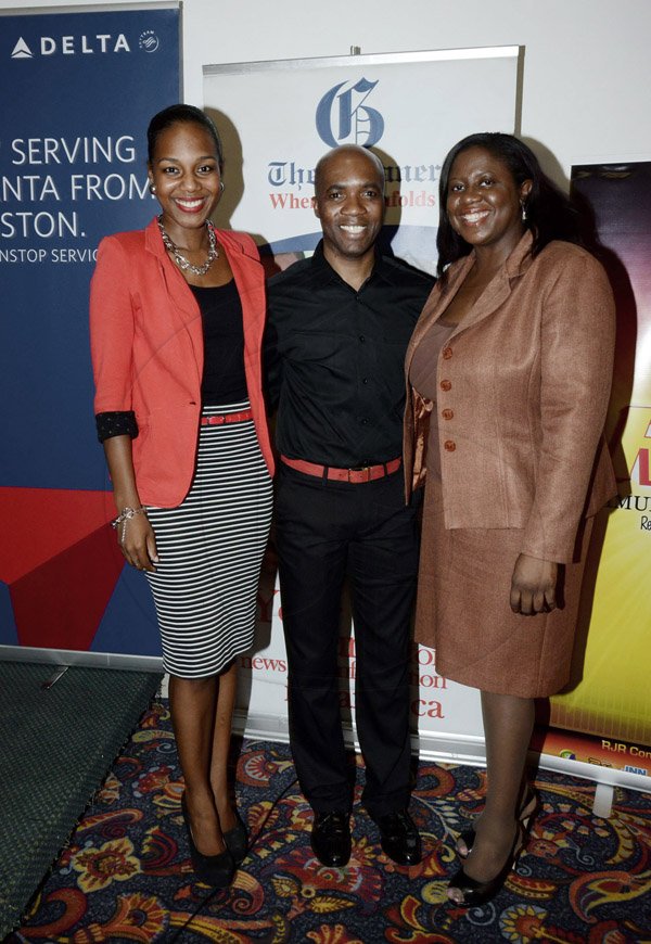 Winston Sill/Freelance Photographer
PUBLIC AFFAIRS DESK:-----Troy Powell, artistic director of Ailey II gets the paparazzi treatment with Gleaner duo Terri-Karelle Reid (left), online brand manager and Terry-Anne Wilson, assistant manager, Business Development and Marketing.
Wolmers Trust presents the Media Launch of Ailey2, held at the Jamaica Pegasus Hotel, New Kingston on Thursday night may 29, 2014.