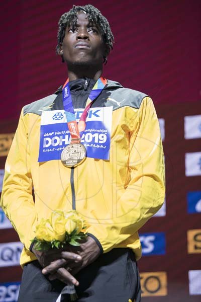 Tajay Gayle, Jamaica’s first world champion in the long jump event, on the medal podium at the  2019 IAAF World Athletic Championships held at the Khalifa International Stadium in Doha, Qatar on Sunday September 29, 2019.