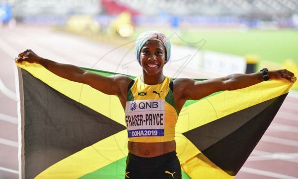 Newly crowned world champion Shelly-Ann Fraser-Pryce celebrates her win in the 100m women finalat the 2019 IAAF World Athletic Championships held at the Khalifa International Stadium in Doha, Qatar on Sunday September 29, 2019.