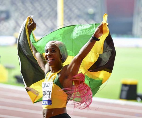 Newly crowned world champion Shelly-Ann Fraser-Pryce celebrates her win in the women 100m final at the 2019 IAAF World Athletic Championships held at the Khalifa International Stadium in Doha, Qatar on Sunday September 29, 2019.