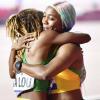 Newly crowned world champion Shelly-Ann Fraser-Pryce celebrates her win in the 100m women final with event bronze medalist Marie -Josee Ta Lou at the 2019 IAAF World Athletic Championships held at the Khalifa International Stadium in Doha, Qatar on Sunday September 29, 2019.