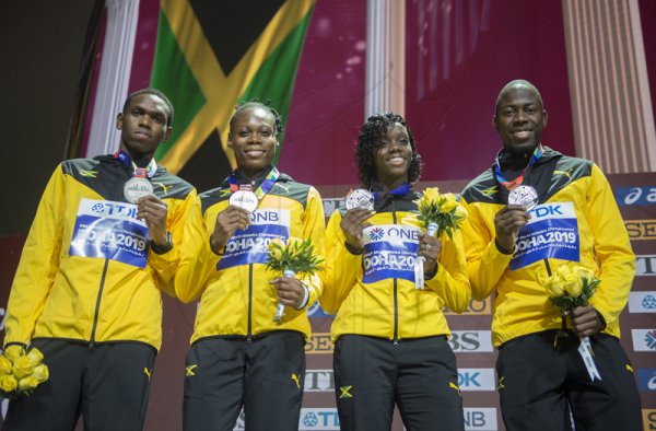 Members of the 4x400 mixed relay team stood on the silver side of the medal platform, earning jamaica’s second medal in the