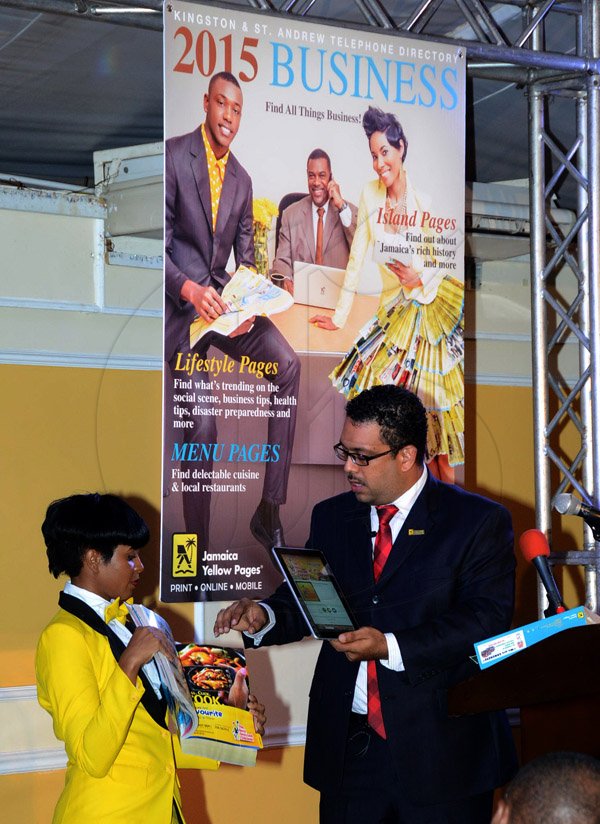 Winston Sill/Freelance Photographer
PUBLIC AFFAIRS DESK:------Jamaica Yellow Pages presents the 2015 Directory and Augmented Reality Launch, held at the Terra Nova All-Suite Hotel, Waterloo Road on Tuesday night November 25, 2014.