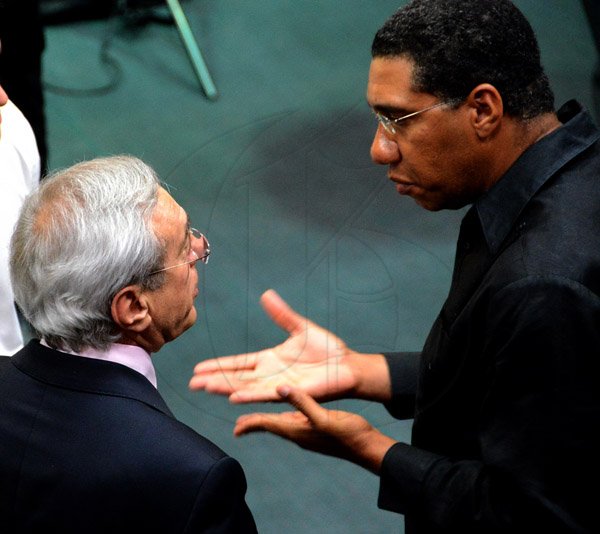 Winston Sill/Freelance Photographer
The National Youth Orchestra of Jamaica (NYOJ)  presents the YOA Orchestra of the Americas (YOA) in Concert, held at Church On The Rock, St. Andrew on Thursday night July 24, 2014. Here are Vladimir Polenov (left), Russian Ambassador; and Andrew Holness (right), Opposition Leader.