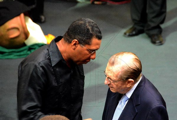 Winston Sill/Freelance Photographer
The National Youth Orchestra of Jamaica (NYOJ)  presents the YOA Orchestra of the Americas (YOA) in Concert, held at Church On The Rock, St. Andrew on Thursday night July 24, 2014. Here are Andrew Holness (left), Opposition Leader;  and former Prime Minister Edward Seaga (right).
