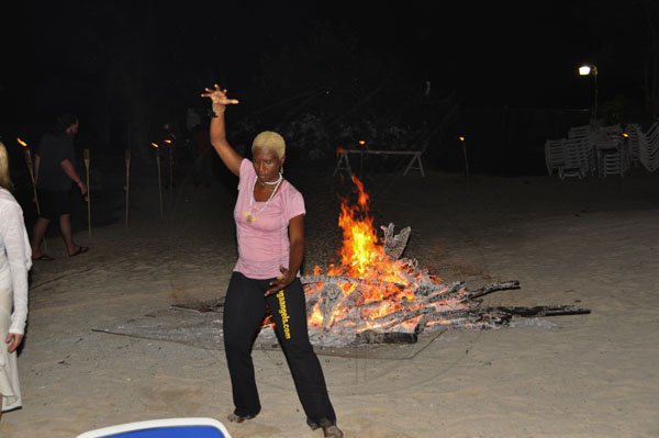 Janet Silvera Photo
 
Subhadra Bowman did not need a bonfire behind her to emanate the heat she exuded at the Caribbean Yoga Conference yogi's reach on the Sugar Mill beach at the Hilton Rose Hall Resort and Spa Sugar, Montego Bay last Thursday night