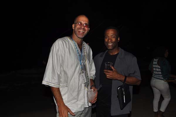 Janet Silvera Photo
 
Stewart Maxwell (left) and Jeff W. Jones at the Caribbean Yoga Conference beach party on the Sugar Mill beach at the Hilton Rose Hall Resort and Spa, Montego Bay last Thursday night