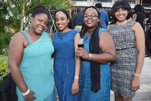 Rudolph Brown/PhotographerFrom left: Barbadians Alian Ollivierre, Simera Crawford, Kayanna Burke and Tahyra Noel share smiles with our camera.